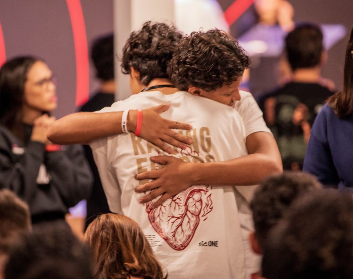 Two young people embracing